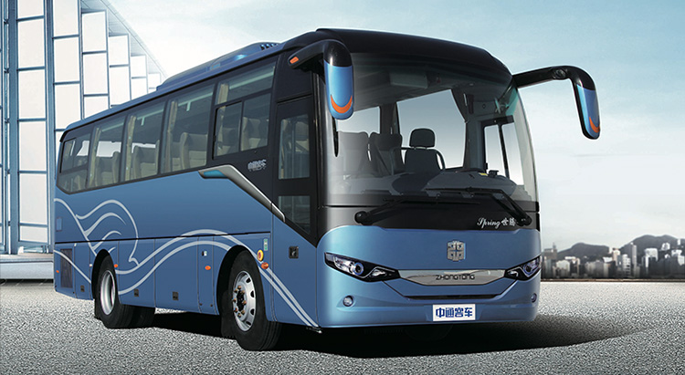 Spacious blue bus parked near Dubai Marina, part of our Dubai bus rental offerings.